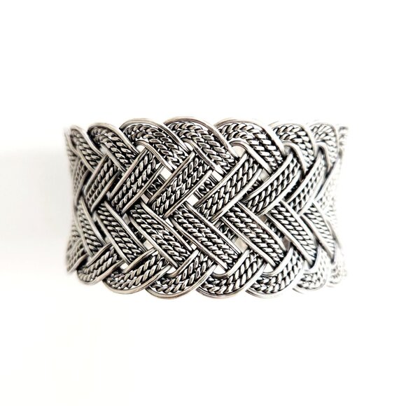 BRAIDED 925 SILVER CUFF.